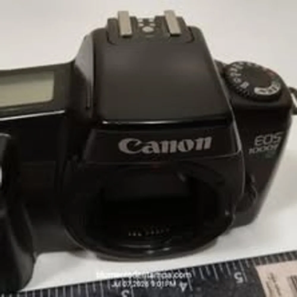 Canon EOS 1000F N 35mm SLR film camera body in black.